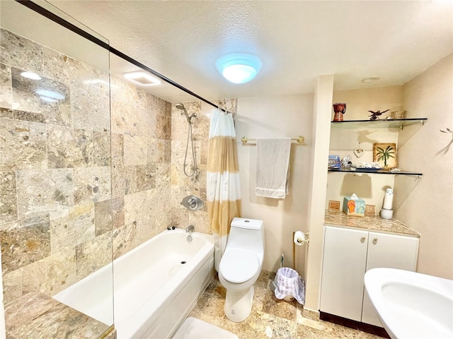 bathroom with a textured ceiling, shower / bath combo, and toilet