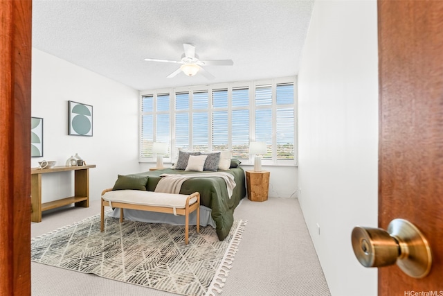 4340 Pahoa Ave Unit 19D, Honolulu, HI 96816 - carpeted bedroom featuring a ceiling fan and a textured ceiling