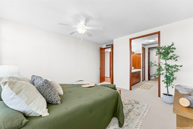 4340 Pahoa Ave Unit 19D, Honolulu, HI 96816 - bedroom featuring light carpet, a textured ceiling, and ceiling fan