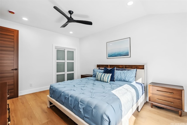bedroom with light wood-style floors, a ceiling fan, and recessed lighting