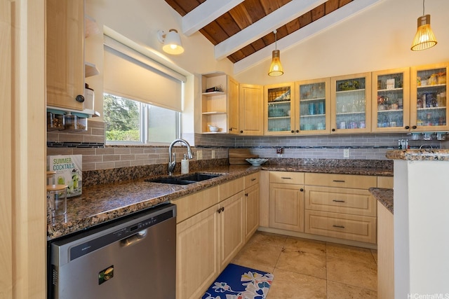 kitchen featuring light brown cabinetry, tasteful backsplash, dishwasher, a sink, and vaulted ceiling with beams