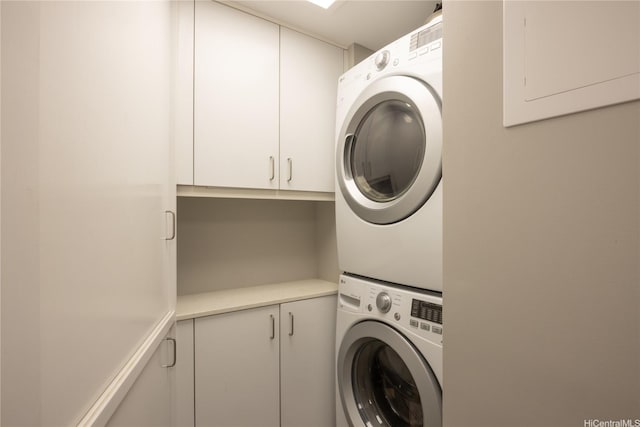 1022 Prospect St Unit 903E, Honolulu, HI 96822 - washroom with estacked washer and dryer and cabinet space