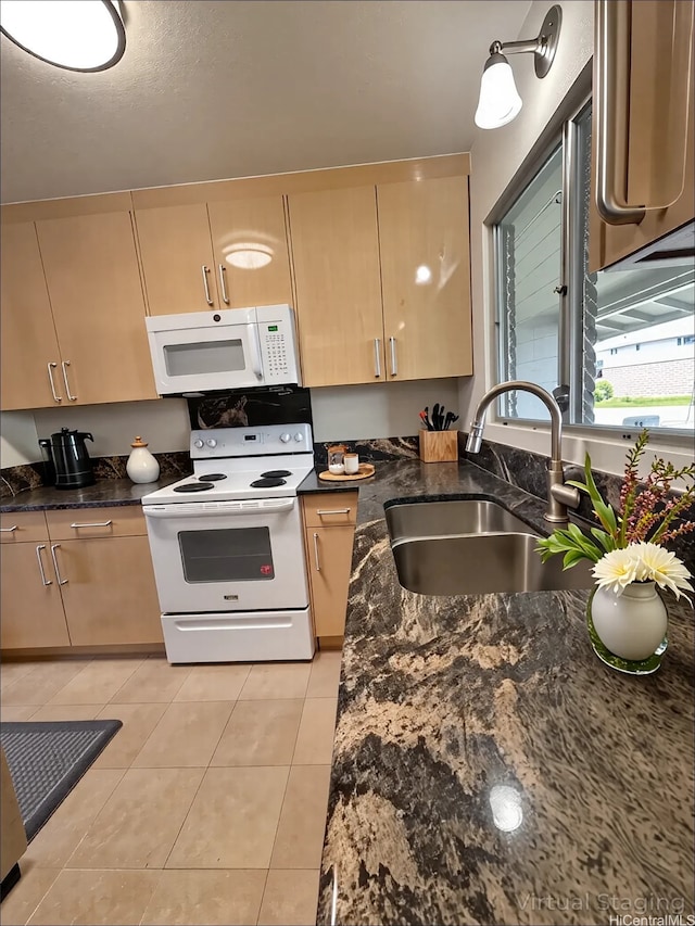 98-833 Noelani St Unit 155, Pearl City, HI 96782 - kitchen with white appliances, a sink, light tile patterned floors, dark stone counters, and light brown cabinets