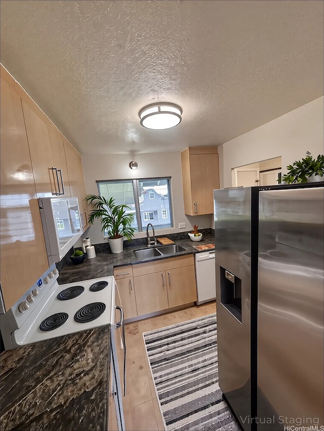 98-833 Noelani St Unit 155, Pearl City, HI 96782 - kitchen with white appliances, light brown cabinets, a textured ceiling, and light tile patterned floors