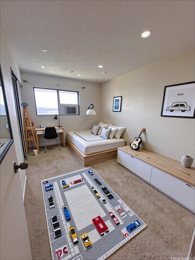 98-833 Noelani St Unit 155, Pearl City, HI 96782 - game room featuring carpet floors, a desk, recessed lighting, a textured ceiling, and cooling unit