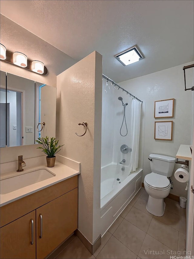 98-833 Noelani St Unit 155, Pearl City, HI 96782 - full bathroom featuring toilet, tile patterned flooring, vanity, shower / bath combo with shower curtain, and a textured ceiling