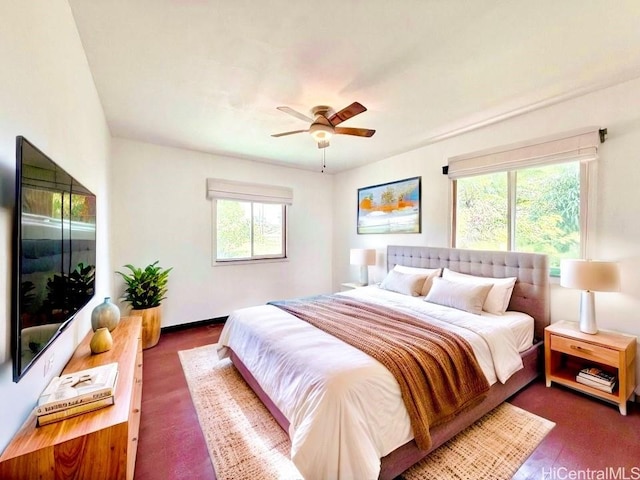 84-921 Lahaina St Unit A, Waianae, HI 96792 - bedroom with multiple windows, wood finished floors, and ceiling fan