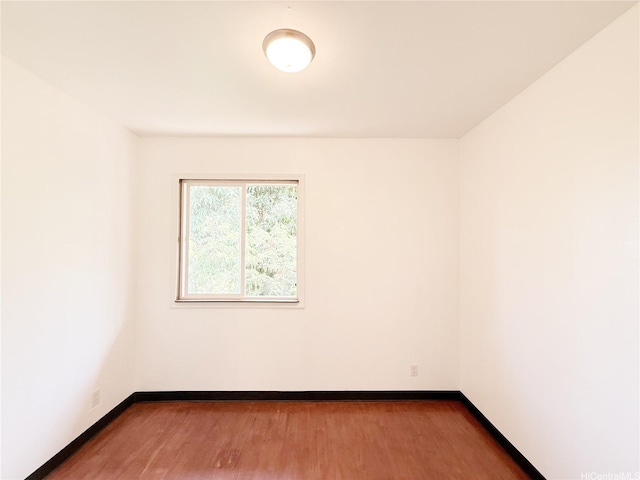 84-921 Lahaina St Unit A, Waianae, HI 96792 - unfurnished room with wood finished floors and baseboards