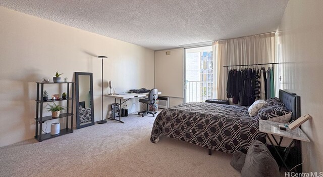 364 Seaside Ave Unit 1109, Honolulu, HI 96815 - carpeted bedroom with an office area and a textured ceiling