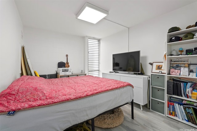 3045 Ala Napuaa Pl Unit 311, Honolulu, HI 96818 - bedroom featuring wood finished floors