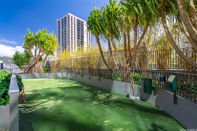 1001 Queen St Unit 1010, Honolulu, HI 96814 - view of community with a fenced backyard