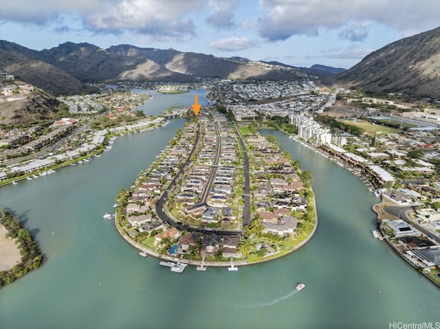 bird's eye view with a residential view and a water and mountain view
