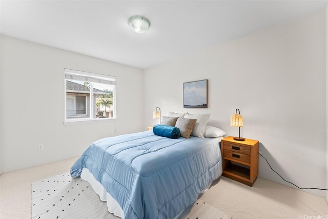 bedroom featuring carpet