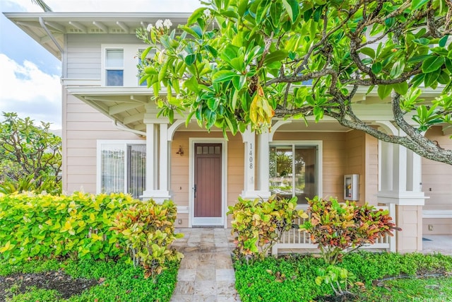 property entrance with a porch