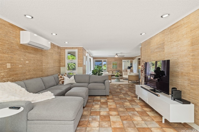 760 Onaha St, Honolulu, HI 96816 - living area with an AC wall unit, a ceiling fan, recessed lighting, healthy amount of natural light, and a textured ceiling