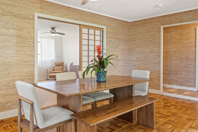 760 Onaha St, Honolulu, HI 96816 - dining area featuring a ceiling fan, baseboards, and a textured ceiling