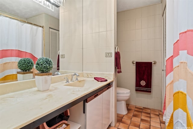 760 Onaha St, Honolulu, HI 96816 - full bath with tile walls, vanity, tile patterned floors, toilet, and a shower with shower curtain