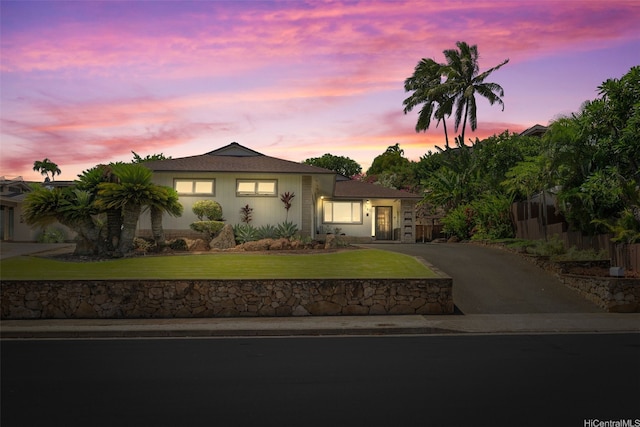 760 Onaha St, Honolulu, HI 96816 - view of front of property with asphalt driveway and a front yard