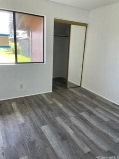 2069 California Ave Unit 7A, Wahiawa, HI 96786 - unfurnished bedroom featuring wood finished floors and a closet