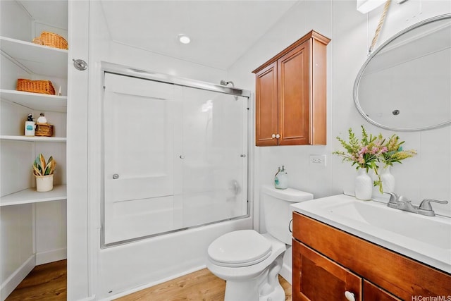 92-783 Makakilo Dr Unit C19, Kapolei, HI 96707 - bathroom featuring wood finished floors, vanity, toilet, and enclosed tub / shower combo
