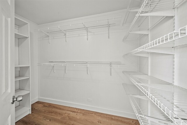 92-783 Makakilo Dr Unit C19, Kapolei, HI 96707 - spacious closet featuring wood finished floors