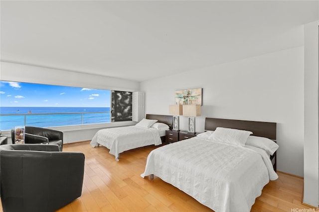 2895 Kalakaua Ave Unit 1202, Honolulu, HI 96815 - bedroom featuring light wood-style flooring