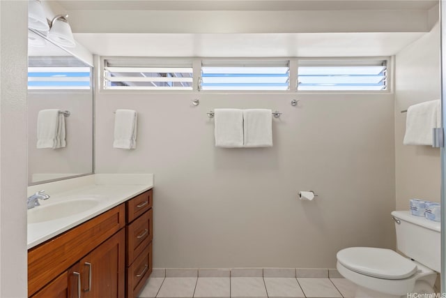 2161 Kalia Rd Unit 1112, Honolulu, HI 96815 - bathroom featuring toilet, vanity, tile patterned floors, and baseboards
