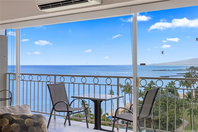 2161 Kalia Rd Unit 1112, Honolulu, HI 96815 - balcony featuring a water view and an AC wall unit