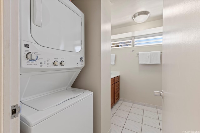2161 Kalia Rd Unit 1112, Honolulu, HI 96815 - washroom with stacked washer / drying machine and light tile patterned floors