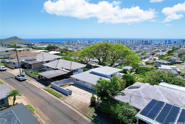 birds eye view of property with a city view