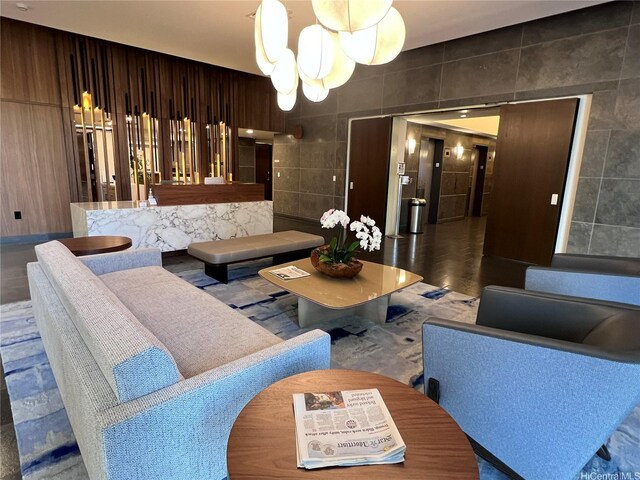 1200 Queen Emma St Unit 1401, Honolulu, HI 96813 - living area featuring tile walls and a chandelier