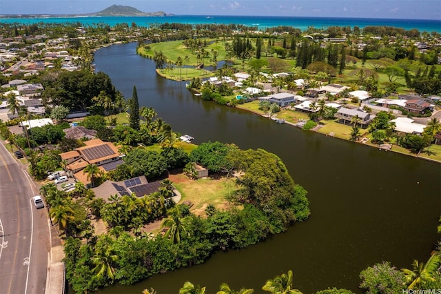 bird's eye view with a water view and a residential view