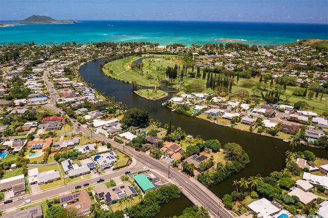 birds eye view of property featuring a water view and a residential view