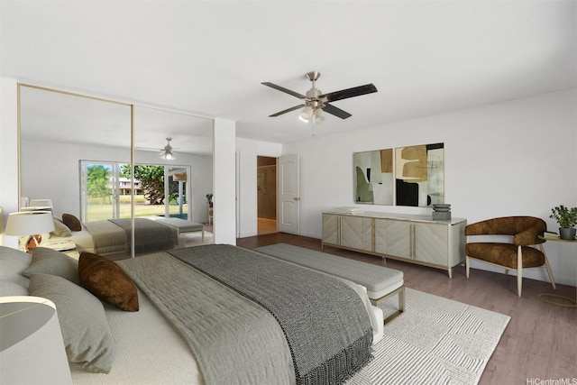 bedroom with access to outside, wood finished floors, baseboards, and ceiling fan