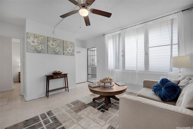 98-114 Lipoa Pl Unit 209, Aiea, HI 96701 - living area featuring a ceiling fan and a textured ceiling
