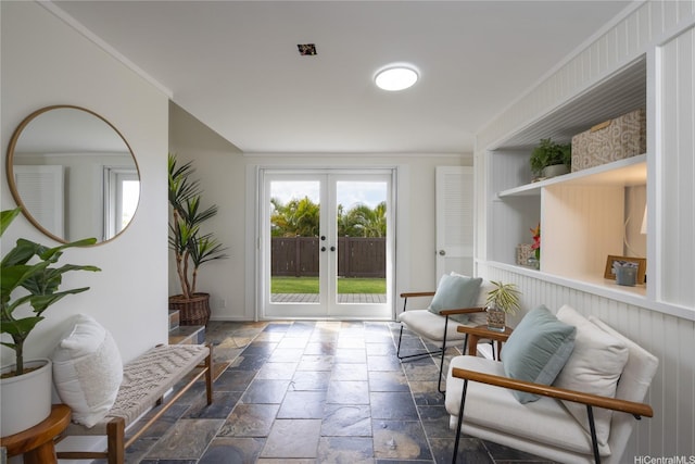 44-102 Kauinohea Pl, Kaneohe, HI 96744 - living area featuring stone tile flooring, french doors, baseboards, and built in shelves