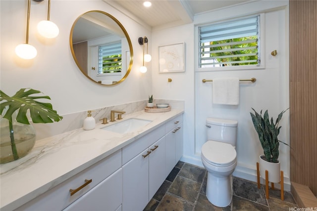 44-102 Kauinohea Pl, Kaneohe, HI 96744 - bathroom featuring stone tile flooring, toilet, vanity, and baseboards