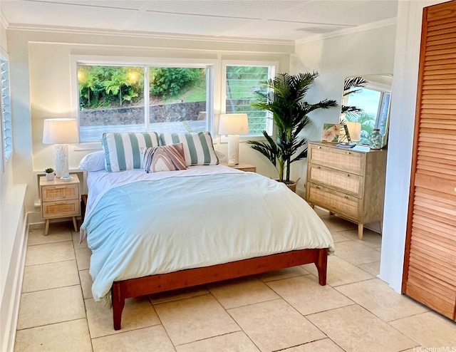 44-102 Kauinohea Pl, Kaneohe, HI 96744 - bedroom with crown molding, light tile patterned floors, and a closet