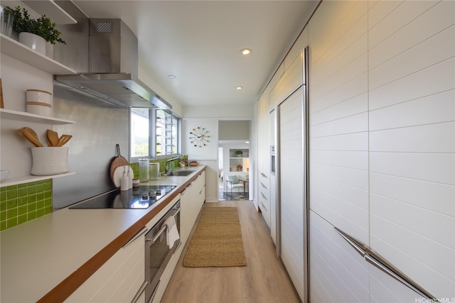 44-102 Kauinohea Pl, Kaneohe, HI 96744 - kitchen with wall oven, open shelves, light wood-style floors, range hood, and black electric cooktop