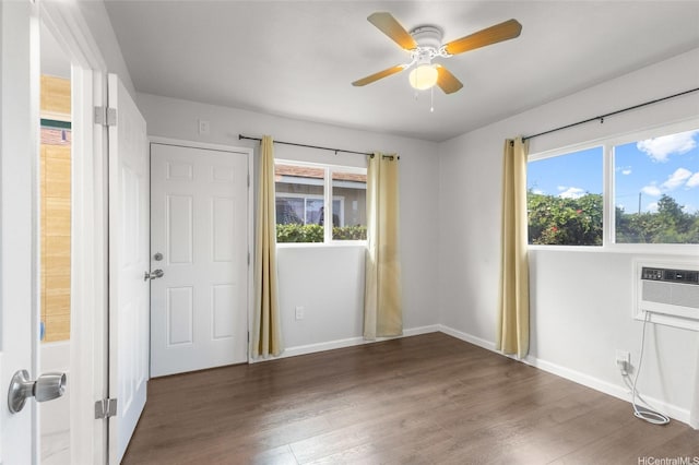 84-541 Nukea St, Waianae, HI 96792 - empty room featuring plenty of natural light, wood finished floors, baseboards, and ceiling fan