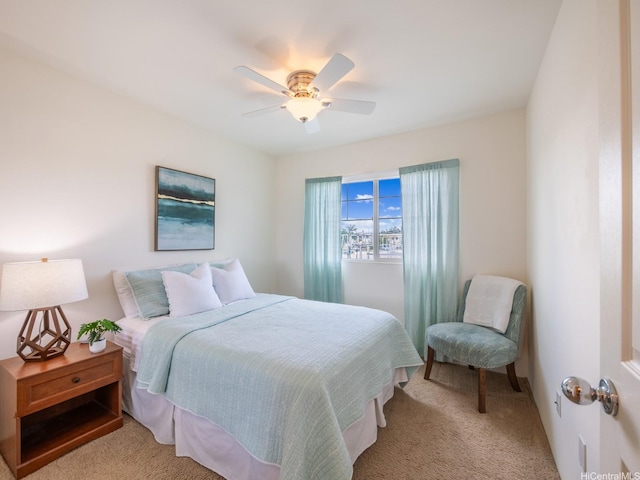 91-2067 Kaioli St Unit 503, Ewa Beach, HI 96706 - bedroom featuring light colored carpet and a ceiling fan