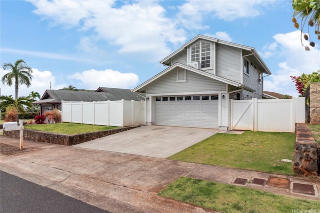traditional home featuring driveway, a garage, and a gate