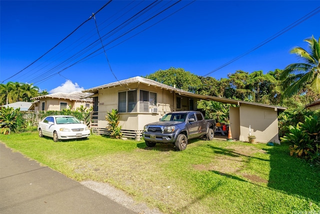 view of front of home with a front yard