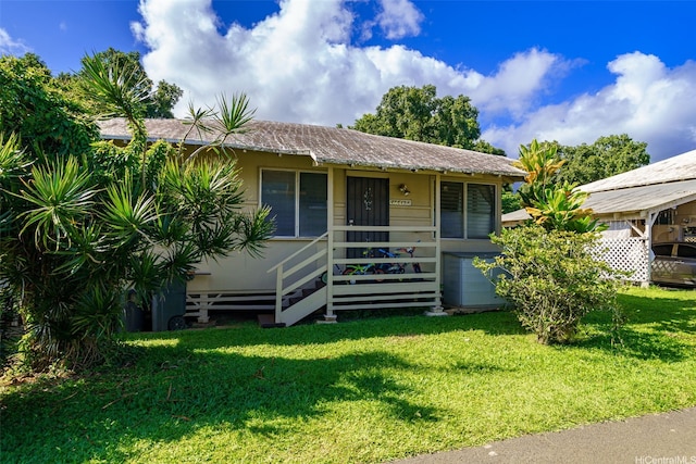 view of front of home with a front yard