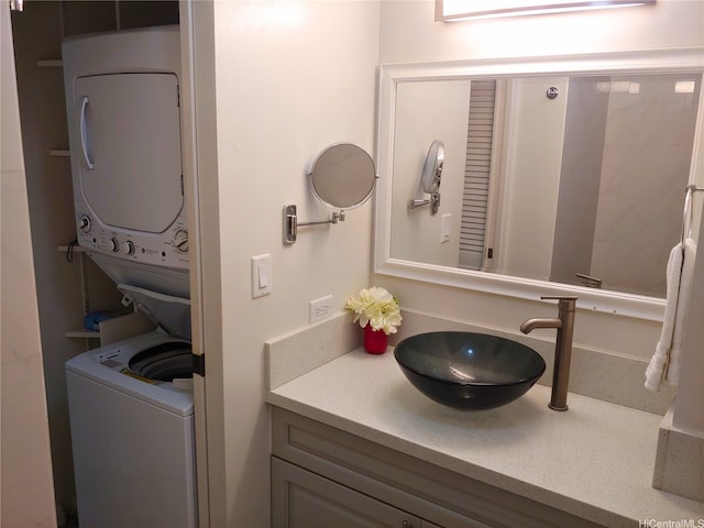 2345 Ala Wai Blvd Unit 1010, Honolulu, HI 96815 - bathroom featuring vanity and stacked washer and dryer