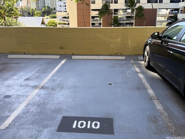 2345 Ala Wai Blvd Unit 1010, Honolulu, HI 96815 - uncovered parking lot with fence
