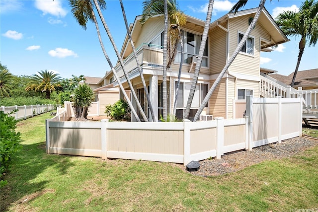 91-1012 Laaulu St Unit 28A, Ewa Beach, HI 96706 - rear view of house with a balcony