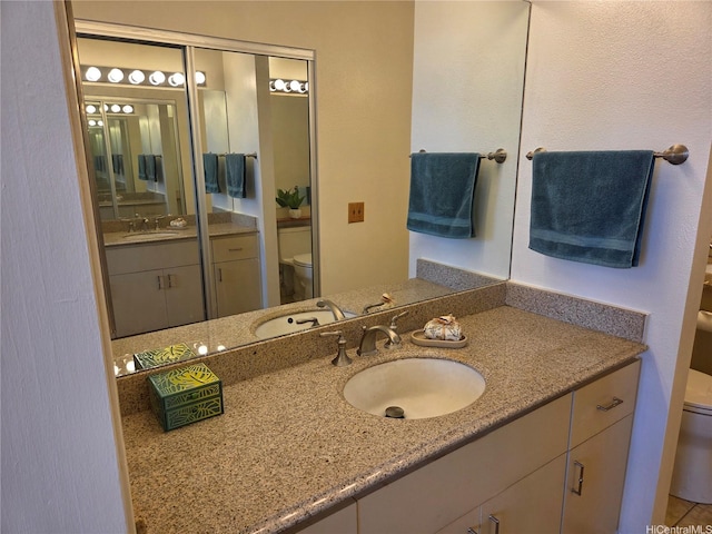 91-1012 Laaulu St Unit 28A, Ewa Beach, HI 96706 - bathroom featuring toilet and vanity