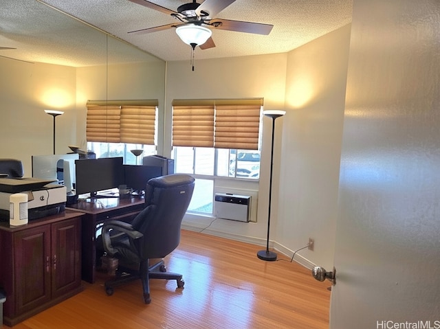91-1012 Laaulu St Unit 28A, Ewa Beach, HI 96706 - office area featuring light wood-type flooring, ceiling fan, and a textured ceiling