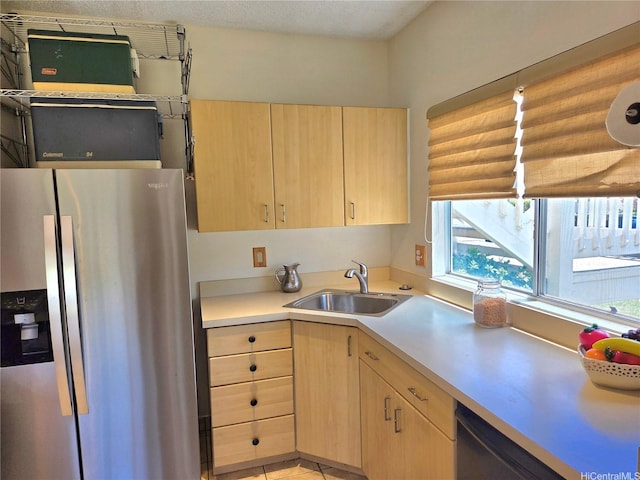 91-1012 Laaulu St Unit 28A, Ewa Beach, HI 96706 - kitchen with stainless steel fridge with ice dispenser, light brown cabinets, and healthy amount of natural light